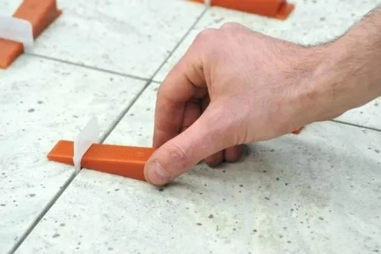 Venta al por mayor Herramientas para azulejos Sistema de nivelación espaciadora Sistema espaciador de cuñas niveladoras para azulejos